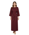 Long women's dress with batwing sleeves and a fitted waist, flowing silhouette