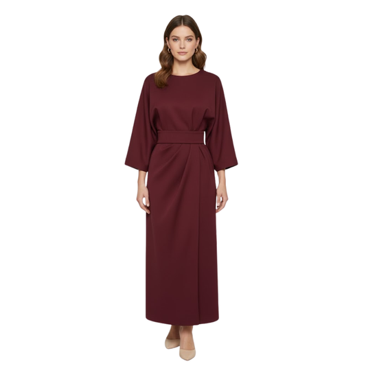 Long women's dress with batwing sleeves and a fitted waist, flowing silhouette