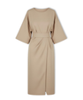 Long women's dress with batwing sleeves and a fitted waist, flowing silhouette