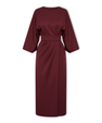 Long women's dress with batwing sleeves and a fitted waist, flowing silhouette